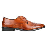 Carol: Tan wingtip Derby